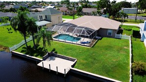 Overhead view of the backyard area and dock.