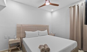 Bedroom with king-size bed and Smart TV