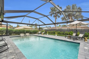 Pool Area: Dive into relaxation under the sun with palm views and stylish loungers!