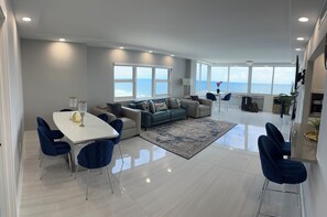 Dining, living room, kitchen nook, hi-top table area with spectacular view.