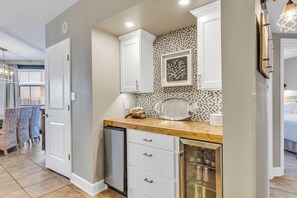 Bar with ice maker and  beverage cooler