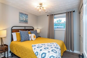 Find restful nights in the second bedroom, furnished with another queen bed for ultimate comfort and relaxation.