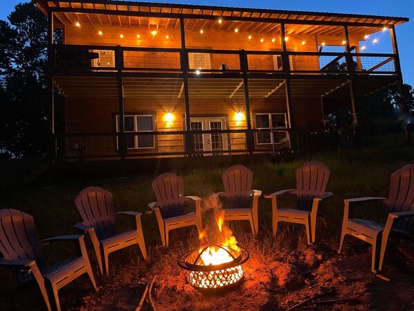 Large firepit with plenty of seating perfect for roasting marshmellows!