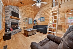 Living Room with Seasonal Wood Burning Fireplace