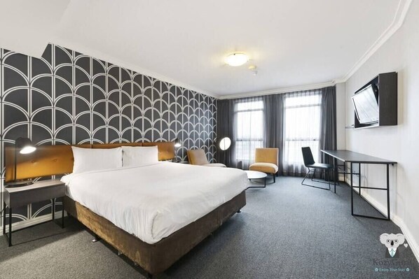 One Queen size bed & side table
