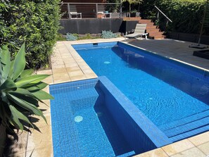 8 metre solar heated Pool and gas heated Spa with Cabana in the background.