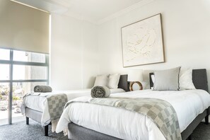 Second bedroom featuring 2 x single beds.