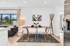 Dining table for 4, with 4 additional counter stools at the counter