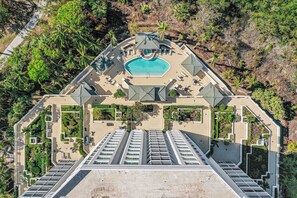 DN905 - The Antiqua pool and walkway to the pedestrian gate at Bluebill Ave for beach access
