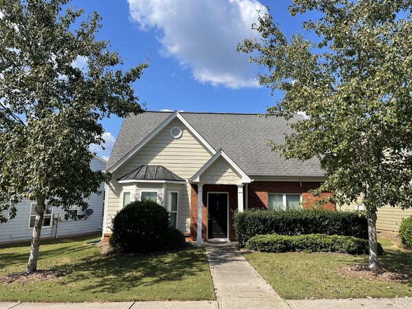 Adorable home with designated parking in the rear