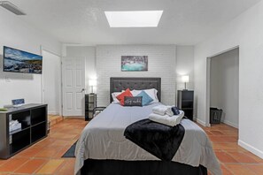 This room should be reserved for the guest who would like to sleep under the moon and stars and wake up with the morning sun as there is a sky light over the bed.