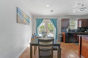 Plush comfy furniture in the family room to relax and watch your favorite shows or movie on the 65" smart TV.