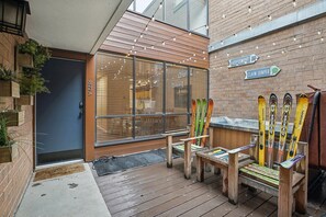 Private patio with tea lights, tub and heat mats