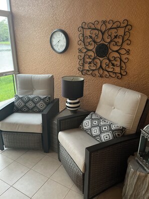 Comfy swivel rocker chairs on the lanai
