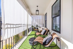 Front covered porch - adjustable lighting and privacy curtains