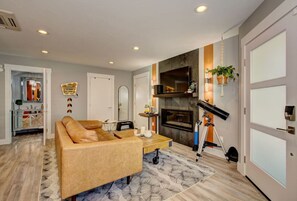 Fireplace, smart TV, and couch