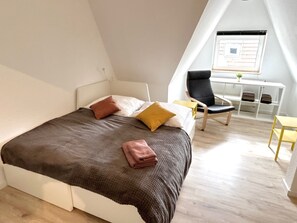 Schlafzimmer mit 2 Doppelbetten
