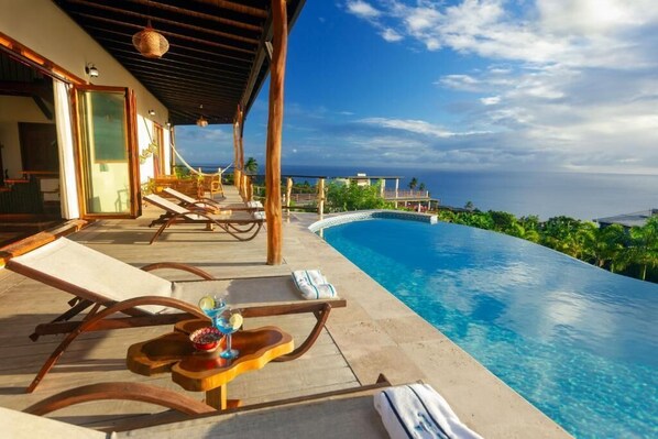 2 level infinity salt water pool with stunning views of the Caribbean Sea