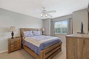Bedroom 2 with Queen bed, TV and private en-suite