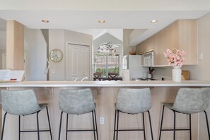 Additional barstool seating for 4