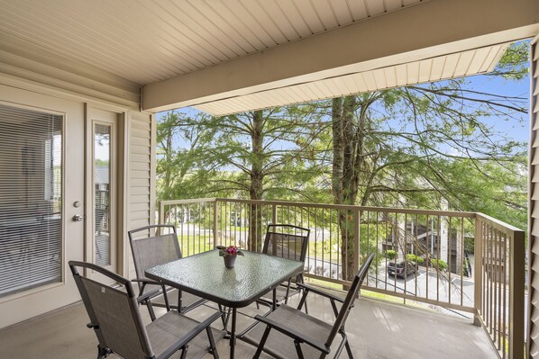 Savor the serene greenery view from the charming balcony
