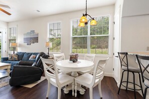 The chic dining table offers seating for 4