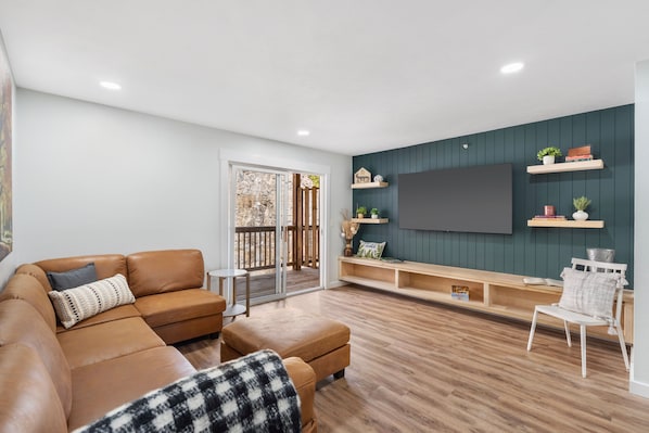 Curl up in the serene living room & stream all your favorite entertainment