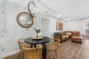 Gather for meals together at the elegant dining table, with seating for 4