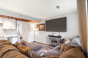 Open living space with ample seating and Smart TV