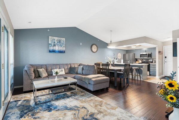 Curl up in the airy living room & stream your favorites on the smart TV