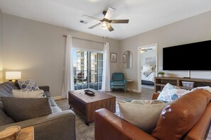 Living room grants you access to balcony