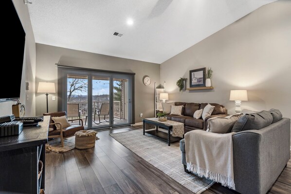 Expansive, open & inviting living area.