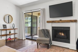 Curl up on the cozy queen sleeper sofa & enjoy a movie night by the fire