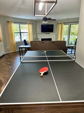 Large dining table converts to ping pong or pool table