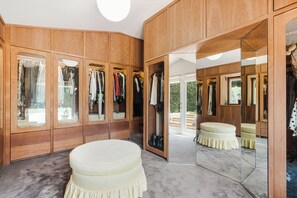 Walk-in closet off of Primary