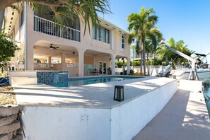 Summerland Sanctuary features a refreshing pool with plenty of shaded areas to relax and enjoy the Florida Keys atmosphere.