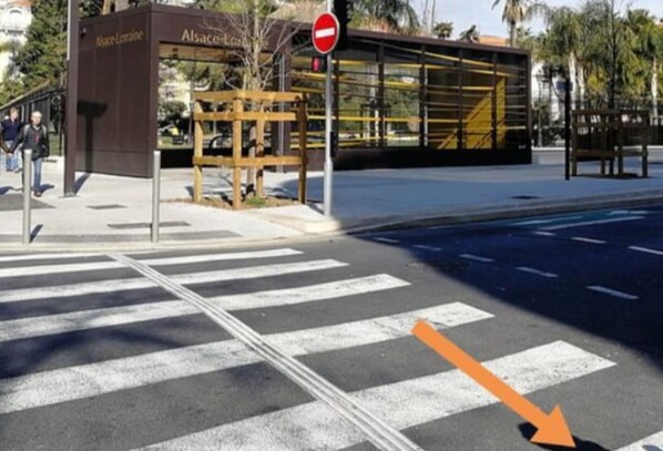 We’re in the block across the street from the tram stop.