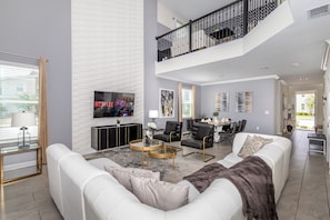 Curl up in the elegant living room & stream your favorites on the smart TV