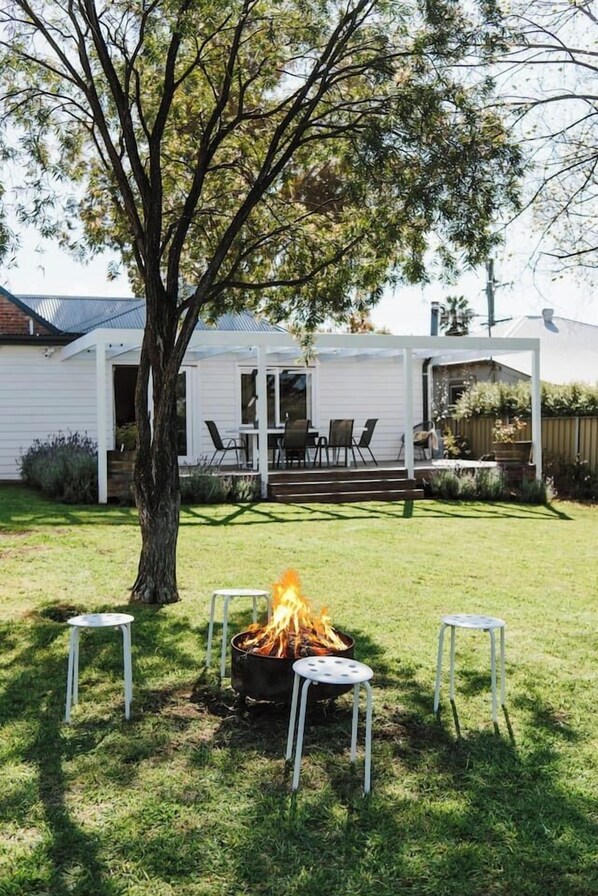 Gather around the fire pit and roast marshmallows under the stars.