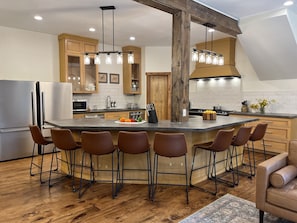 Chef's kitchen! Two refrigerators, stoves, and dishwashers, plus an oversized island!
