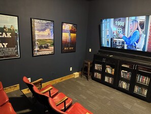 Watch your favorite movies on the big screen  in our 100 year old antique theater seats