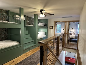 Cozy custom bunks, built in to the loft area (4th bedroom)