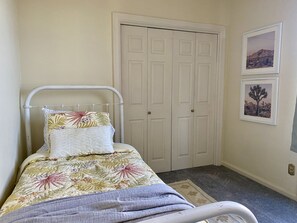 Twin size bed in the second bedroom