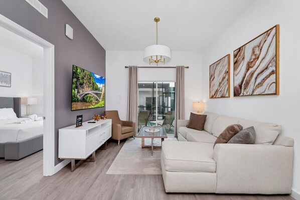 Kick back and relax in this cozy living space with ample seating and a Smart TV for your entertainment.
