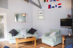   Lounge area in Dunmore Villas Holiday Home No 1 - seaside family-friendly holiday home in Dunmore East, Co. Waterford, Ireland 