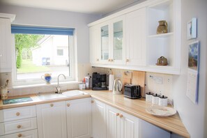   Self catering Kitchen in Dunmore Villas Holiday Home No 1 - seaside family-friendly holiday home in Dunmore East, Co. Waterford, Ireland