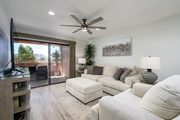 Living room with lots of seating.