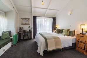 Master bedroom with comfortable king bed, ensuite and walk in wardrobe