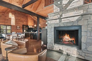 Two story wood fireplace provides relaxing crackle and pop on a cold night.