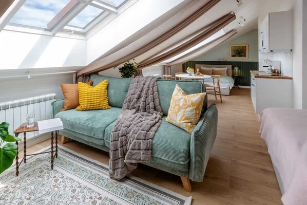 Spacious room flooded with daylight equipped with black-out curtains for good sleep